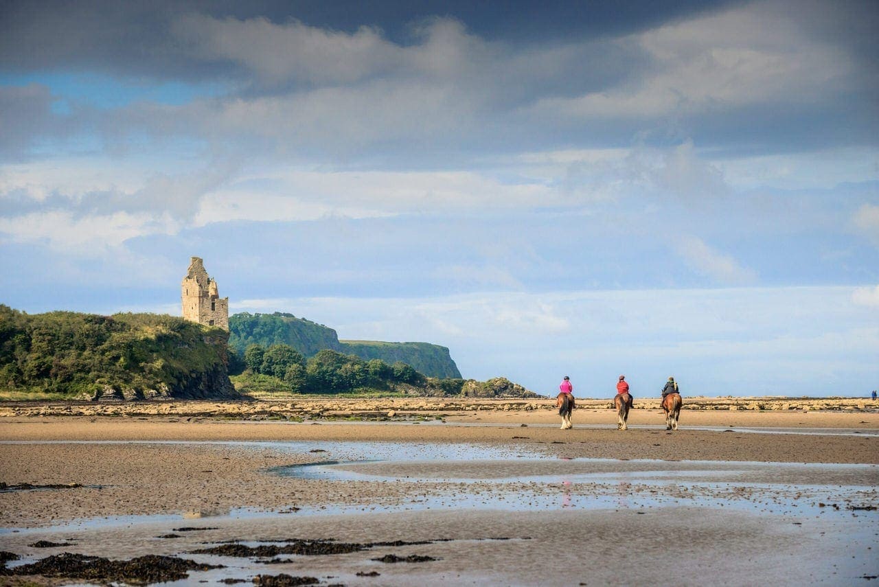 HEADER: Blackstone Clydesdales, Greenan beach and castle view on the South West 300 route